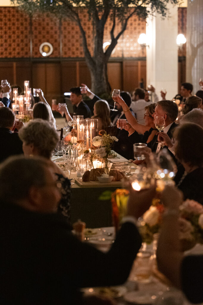 Guests toasting at the reception located at The Exchange in Chicago 