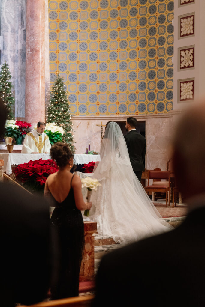 Wedding Ceremony Tips Bride and Groom holding hands at the alter