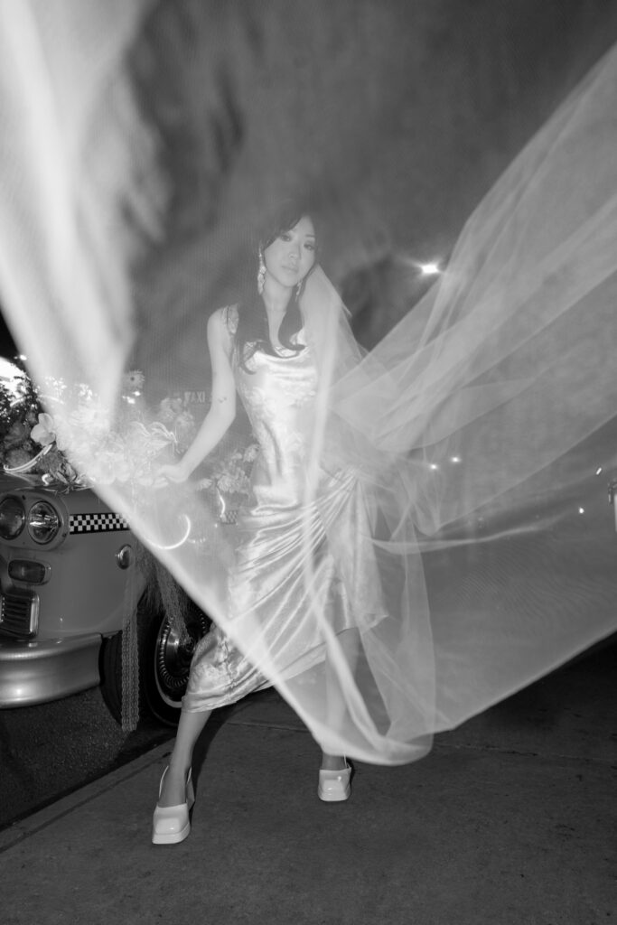 Brooklyn editorial engagement session veil movement black and white editorial photo